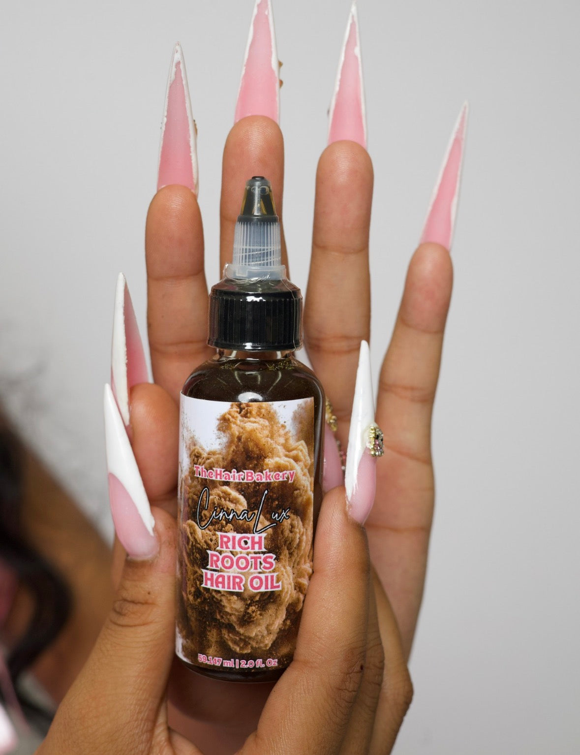 2 OZ cinnalux hair growth oil